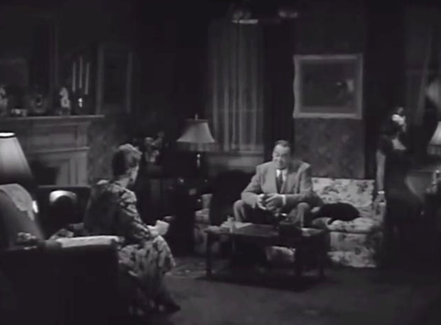 Main Street After Dark - Lieutenant Lorrigan Edward Arnold sitting on couch with black cat lying beside him with Ma Abby Dibson Selena Royle holding gun and Rosalie Dorothy Morris