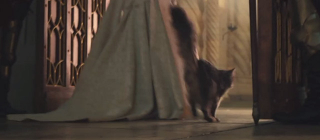 Maleficent Mistress of Evil - tabby cat exiting through door with Queen Ingrith