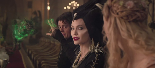 Maleficent Mistress of Evil - tabby cat frozen in midair by Maleficent Angelina Jolie in front of Diaval Sam Riley