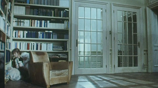 Malina - woman Isabelle Huppert catching white and cream colored longhair cats