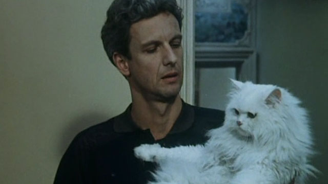 Malina - Mathieu Carrière holding white longhair cat