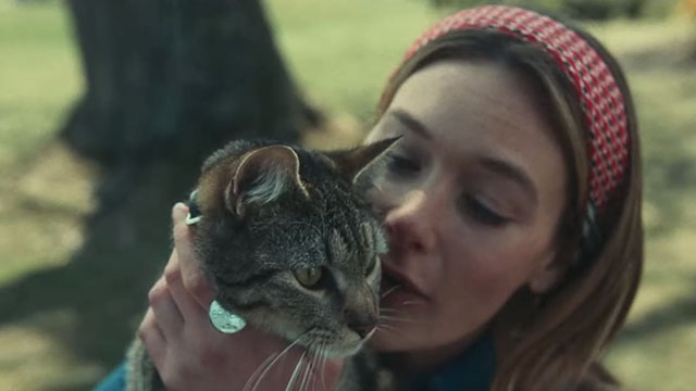 A Man Called Otto - Sonya Rachel Keller holding tabby cat Ernest Bacon