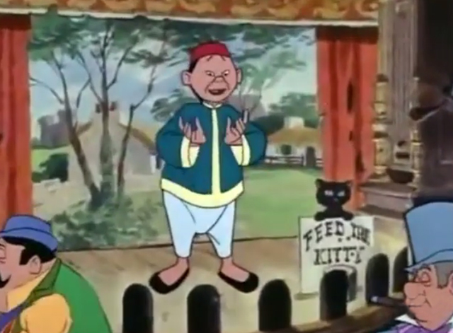 The Man From Button Willow - cartoon Feed the Kitty sign in front of Chinese singer on stage