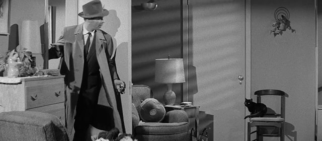 The Man Who Died Twice - black cat sitting on chair in room as Bill Rod Cameron enters