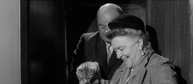 The Man Who Finally Died - woman Miriam Pritchett holding tabby cat Putzi with Brenner Niall McGinnis