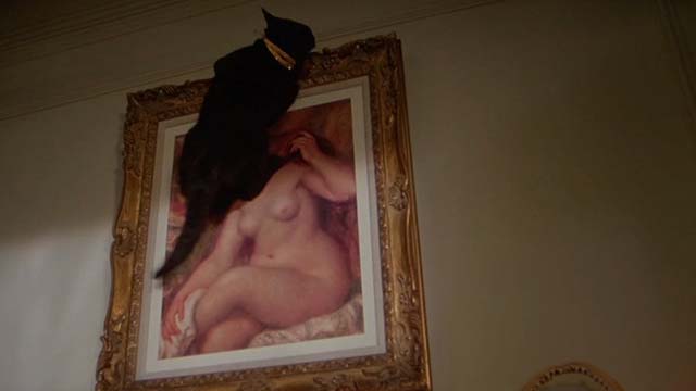 The Man With Two Brains - black cat hanging onto Renoir painting