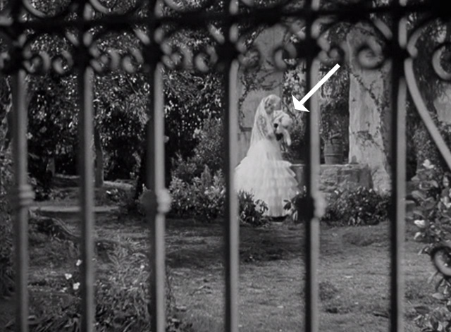 The Mark of Zorro - Lolita Quintero Linda Darnell picking up white cat from bench