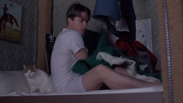 Married to the Mob - Downey Matthew Modine sitting up in bed with orange and white cat