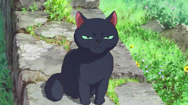 Mary and the Witch's Flower - black cat Tib sitting on wall