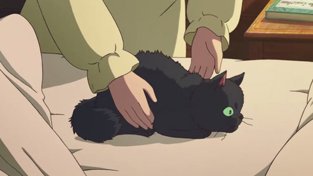 Mary and the Witch's Flower - black cat Tib scared on bed