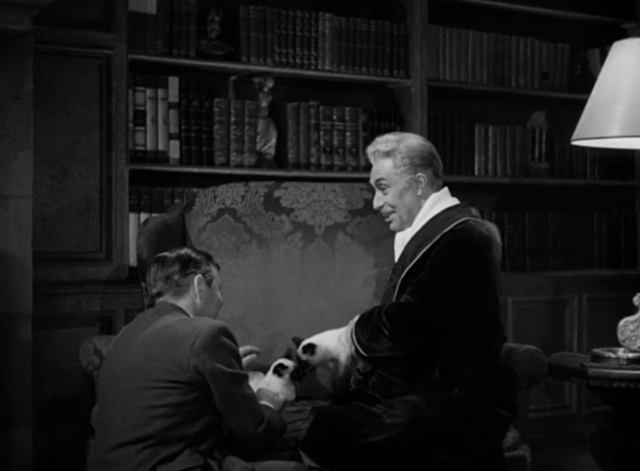 The Mask of Dimitrios - Cornelius Leydon Peter Lorre and Grudek Victor Francen with two Siamese cats Eloisa and Abelard on divan