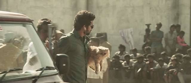 Master - cream Persian cat being carried by JD Thalapathy Vijay onto school grounds