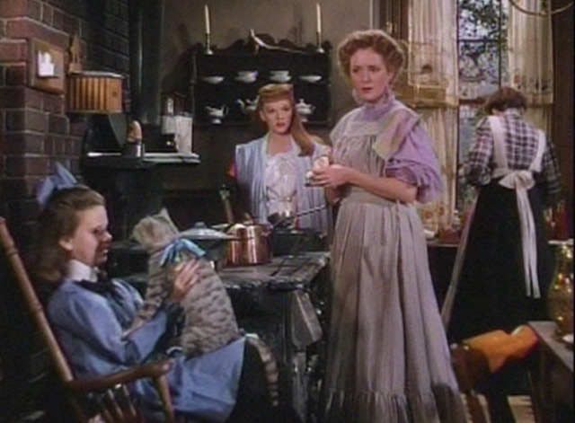 Meet Me in St. Louis - cat Lady Babbie with bow on in Agnes' lap