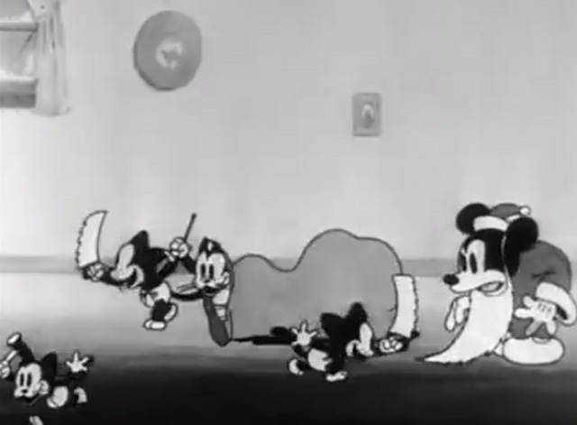 Mickey's Orphans - Mickey Mouse dressed as Santa watching kittens taking hammers, saws and toys from bag