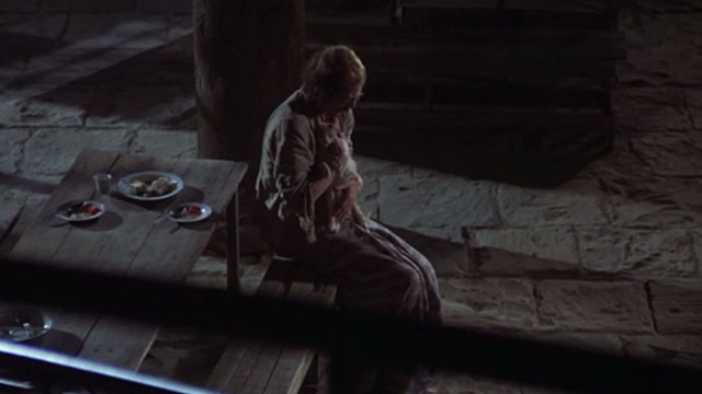 Midnight Express - Max John Hurt sitting and holding dead orange and white cat Higbert