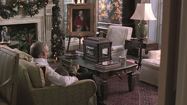 Midnight in the Garden of Good and Evil - Jim Williams Kevin Spacey petting tabby cat Shelton on his lap in chair