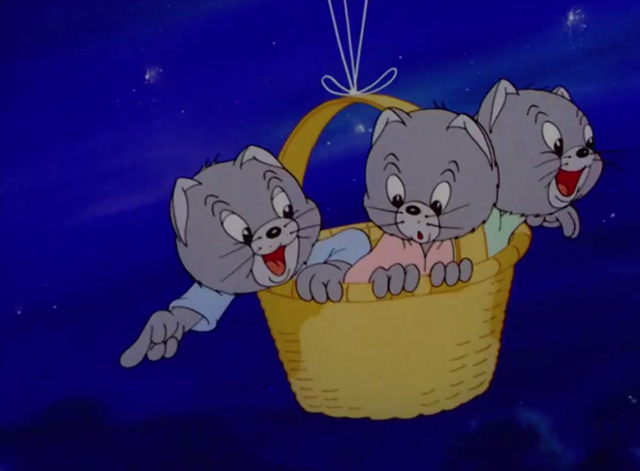 The Milky Way - three little kittens in a basket beneath balloons