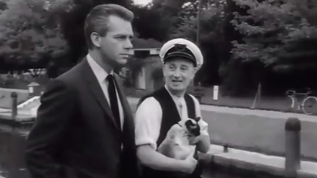 Model for Murder - lock keep Charles Lamb holding Siamese cat Chloe with David Keith Andes