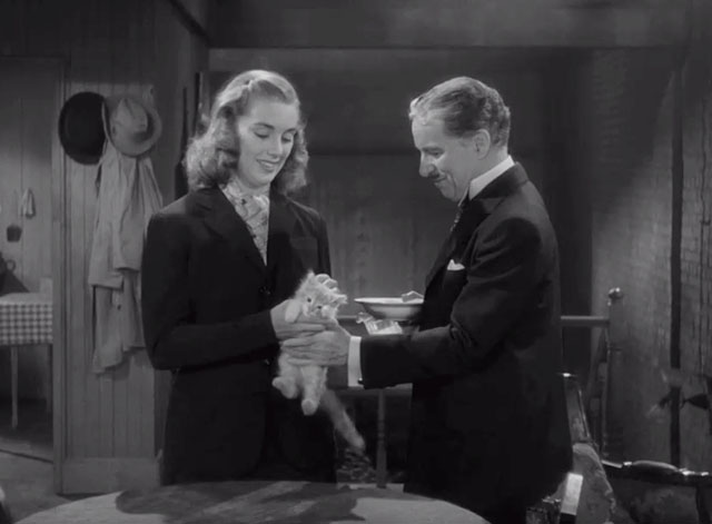 Monsieur Verdoux - girl Marilyn Nash giving tabby kitten to Chaplin who has milk and saucer