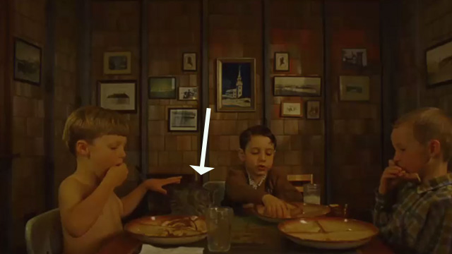 Moonrise Kingdom - tabby kitten sitting on table with three Bishop brothers