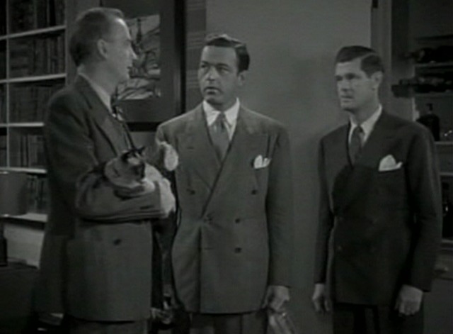 Mr. and Mrs. North - Mullins standing with Siamese cat Pete in arms