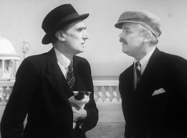 Mr. Beamish Goes South - Potter John Laurie holding black and white tuxedo kitten with the Major Peter Bathurst