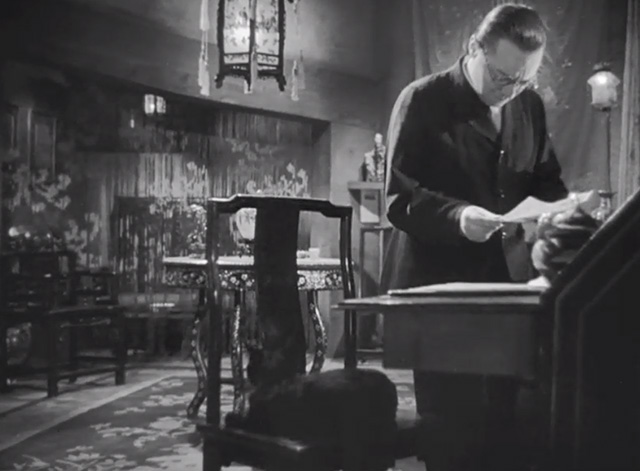 Mr. Moto's Last Warning - black cat Chunkina on chair at desk with Mr. Moto Peter Lorre