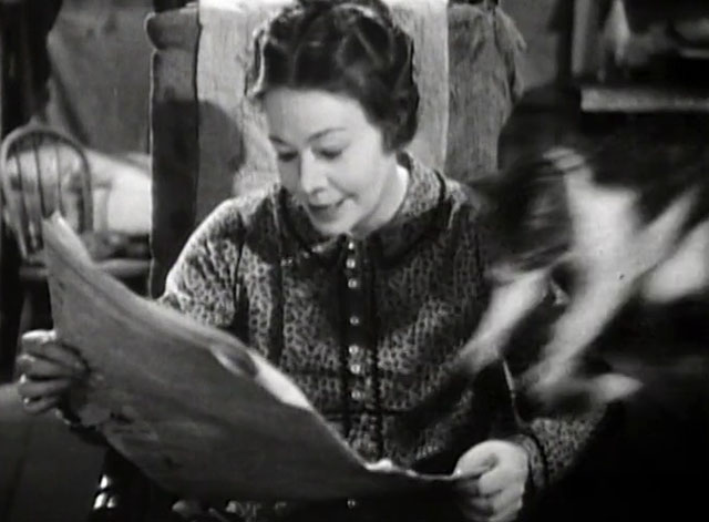 Mrs. Wiggs of the Cabbage Patch - tabby and white cat Bobby about to land on Mrs. Wiggs Pauline Lord as she reads the paper