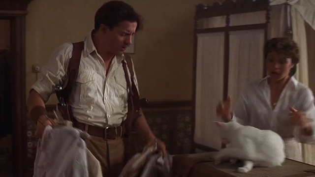 The Mummy - Evelyn Rachel Weisz snatches white cat from suitcase before Rick Brendan Fraser can open it