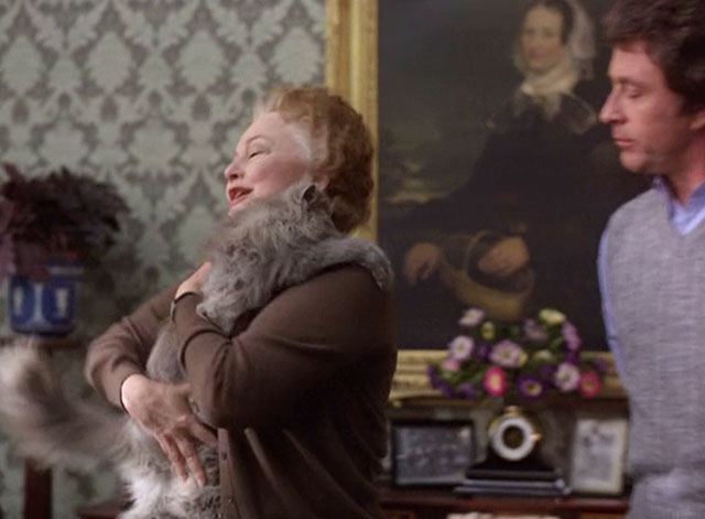 Murder is Easy - Miss Wainfleet Olivia de Havilland picking up longhair Persian diluted calico cat Wonky-Pooh with Luke Bill Bixby
