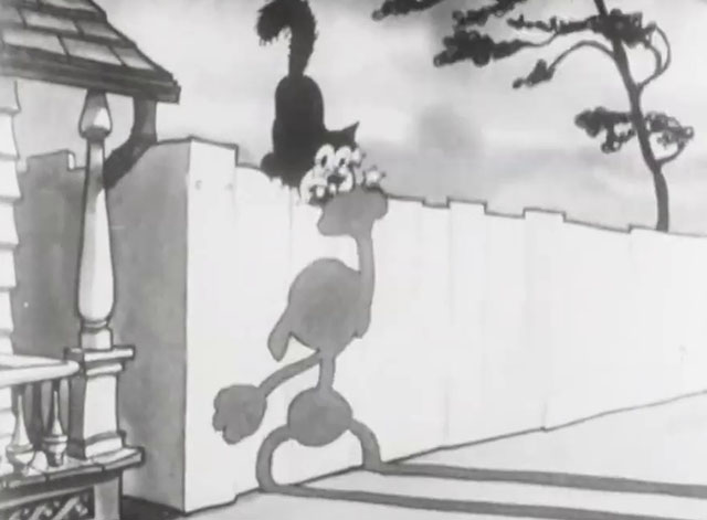 Mysterious Mose - cartoon black cat sitting on fence being punched by shadow