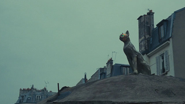 Neige - cat statue on top of building