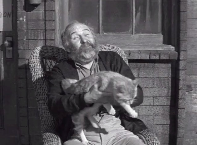 A Nice Little Bank That Should Be Robbed - Pop Charles Arnt holding ginger tabby cat