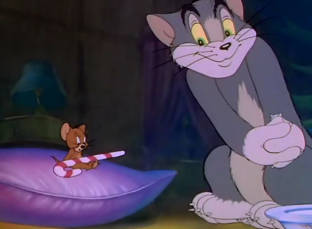 Tom and Jerry - The Night Before Christmas - Tom cat gives Jerry mouse candy cane