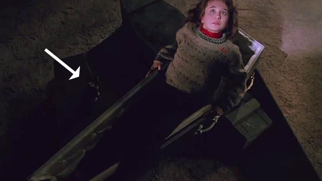 Nightbreed - tabby kitten sitting beside coffin with Lori Anne Bobby in Midian