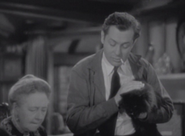 Night Must Fall black cat in Danny's arms