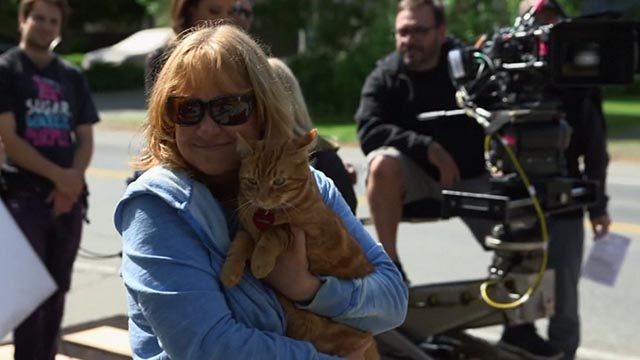 The Nine Lives of Christmas - orange tabby cat Ambrose Trace with trainer Connie Rusgen