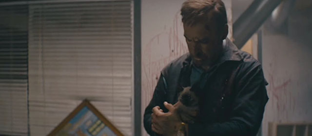 Nobody - Hutch Mansell Bob Odenkirk carrying tiny seal point Siamese kitten