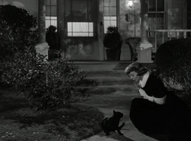 No Sad Songs for Me - black cat with white spot on nose Horace on walk with Mary Margaret Sullavan beside him