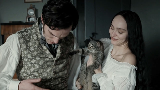 Nosferatu - Ellen Lily-Rose Depp and Thomas Nicholas Hoult with silver tabby cat Greta