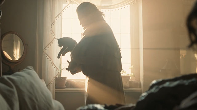 Nosferatu - silver tabby cat Greta in arms of Professor von Franz Willem Defoe