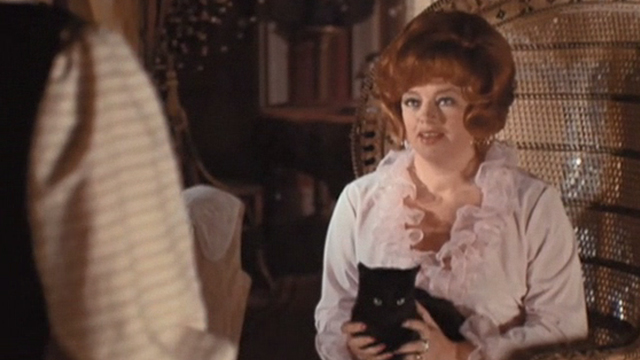 Nothing but the Night - Anna Harb Diana Dors holding black cat on lap