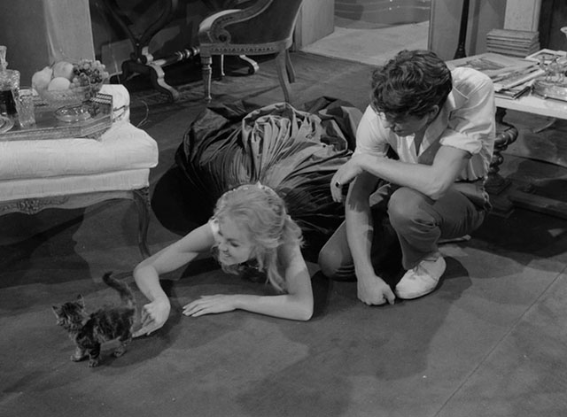 La notte brava - Laura Mylène Demongeot laying on floor playing with longhair tabby kitten with Ruggeretto Laurent Terzieff