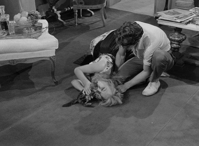 La notte brava - Laura Mylène Demongeot laying on floor playing with longhair tabby kitten with Ruggeretto Laurent Terzieff