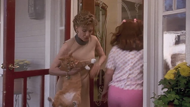 Now and Then - Grandma Albertson Cloris Leachman coming to greet girls at door with orange tabby cat