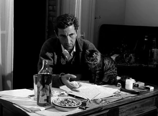 Nuit noire Calcutta - Maurice Garrel with longhair tabby cat on table