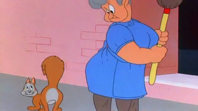 Odor-able Kitty - orange cartoon cat waiting to be hit by woman