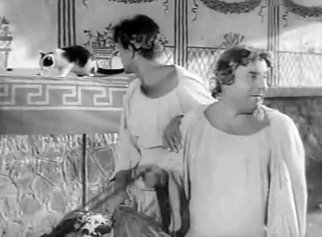 O.K. Nero - Fiorello Walter Chiari and Jimmy Carlo Campanini trying to escape on chariot with white and black cat eating on wall