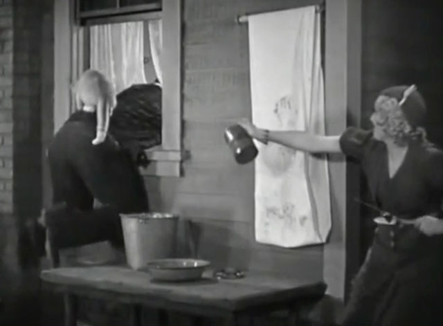 The Old Bull - Thelma Todd pulling on cord after throwing tabby cat on man climbing out window