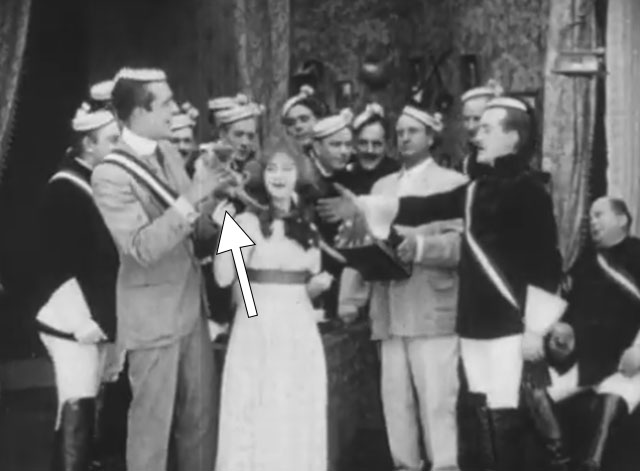 Ole Heidelberg - Karl Wallace Reid holding tabby kitten with Katie Dorothy Gish and other male students